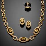 Oval yellow sapphire and diamond yellow gold and black enamel jewelry set comprising - фото 1