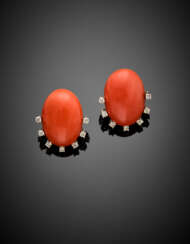Oval orange coral and diamond white gold earrings