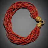 Twelve strand orange coral bead necklace with yellow gold bead spacers and diamond lion head central - photo 1