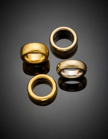 Group of four white and yellow gold band rings - Foto 1