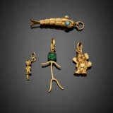 Lot of four yellow gold charms - photo 1