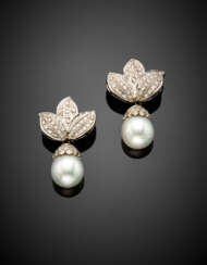 White gold diamond leaf earrings holding two South sea pearl drops of mm 11.50 circa