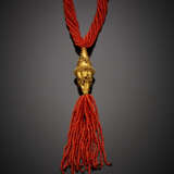 Long multi-strand orange coral bead necklace with a cm 13 circa yellow openwork gold lozenge central and coral tassel - photo 1