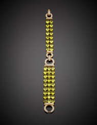 Oval peridot and diamond bi-coloured gold bracelet