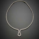 White gold round diamond graduated necklace forming a central eyelet - фото 1