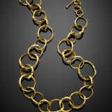 Yellow wrought and drilled gold hoop necklace - photo 1