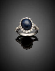 Oval ct. 7.74 circa star sapphire and diamond white gold cluster ring