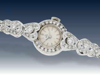 Armbanduhr: ausgefallene vintage Damenuhr, signiert "Ebel" , reichhaltiger Brillantbesatz, 18K Weißgold