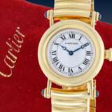 Armbanduhr: äußerst luxuriöse Cartier Damenuhr mit Original-Service-Etui und Originalpapieren von 2001, Modell "Diabolo" Ref.14400 in der luxuriösen Vollgold-Version - фото 1