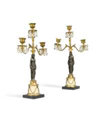 A PAIR OF ORMOLU, PATINATED-BRONZE AND MARBLE THREE-LIGHT FIGURAL CANDELABRA