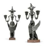 A PAIR OF FRENCH EGYPTIAN REVIVAL PATINATED-BRONZE AND ROUGE GRIOTTE MARBLE TWO-LIGHT CANDELABRA - фото 1