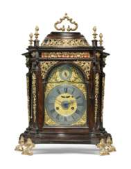 AN ITALIAN GILT-BRASS-MOUNTED WALNUT STRIKING TABLE CLOCK WITH ALARM