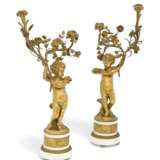 A PAIR OF LOUIS XVI-STYLE ORMOLU AND WHITE MARBLE TWIN-LIGHT CANDELABRA - photo 1