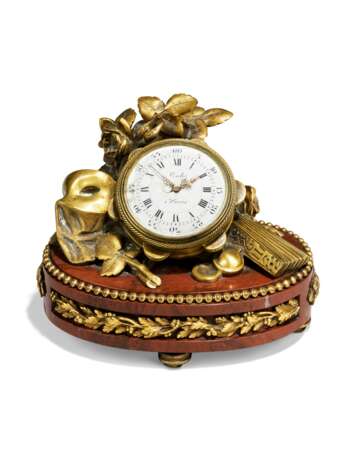 A FRENCH ORMOLU AND ROUGE MARBLE TABLE CLOCK - photo 1