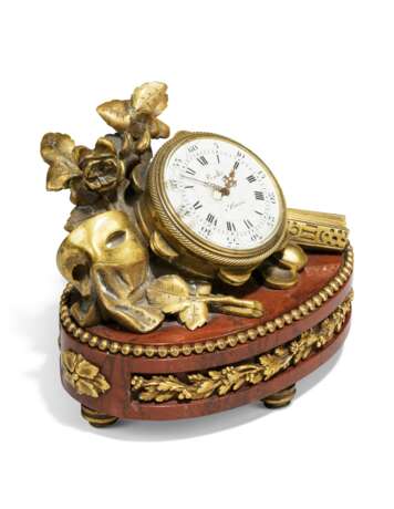 A FRENCH ORMOLU AND ROUGE MARBLE TABLE CLOCK - photo 4