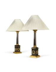 A PAIR OF PATINATED-BRONZE AND LACQUERED-BRASS CORINTHIAN COLUMN TABLE LAMPS