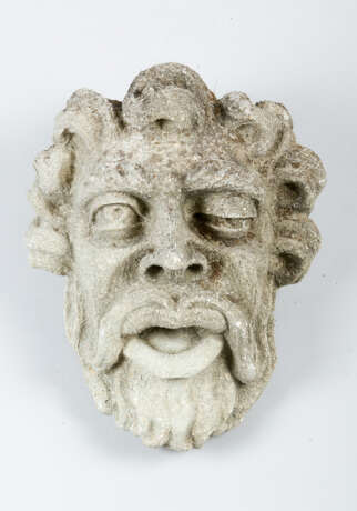 Stone Head of a man with open mouth and beard - photo 1