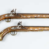 Pair of Oriental pistols with long barrel - фото 1