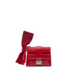 A SHINY RED ALLIGATOR CLUTCH WITH BOW WITH PALLADIUM HARDWARE