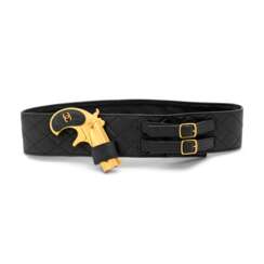 A LIMITED EDITION BLACK LAMBSKIN LEATHER BELT WITH GOLD PISTOL MOTIF