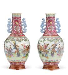 A PAIR OF FINELY ENAMELED FAMILLE ROSE VASES