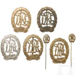 Fünf DRL-Reichsportabzeichen und zwei RSA-Miniaturen, die Abzeichen in Bronze, Silber und Goldausführung
