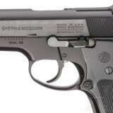 Smith & Wesson Modell 59, "9 mm 14-shot Autoloading Pistol", mit Holster - photo 3