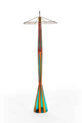Floor lamp with body composed of three overlapping truncated cone elements