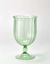 Glass-shaped vase with ribbed body, baluster-shaped stem and bell-shaped foot applied by heat