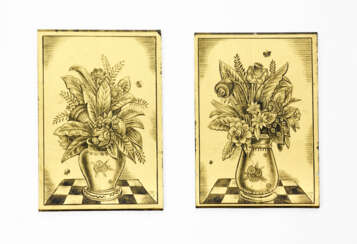 Two glass plates decorated with gold leaf application and hand-painted figuration with a vase of flowers and butterflies in black