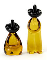 Two sculptures depicting Mexicans