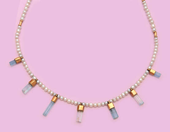 Feine Perlenkette mit Aquamarinen - фото 1
