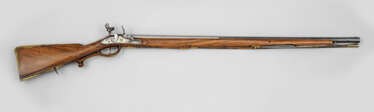 Flintlock rifle with spring bayonet