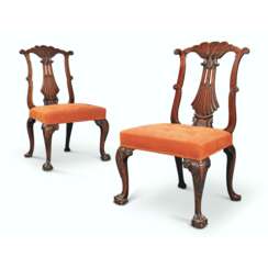 A PAIR OF GEORGE II WALNUT SIDE CHAIRS