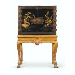 A JAPANESE BLACK AND GILT-LACQUER CABINET ON A GILTWOOD STAND
