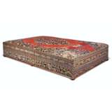 AN ENGLISH CARPET-COVERED STAINED-PINE LARGE OTTOMAN - photo 1