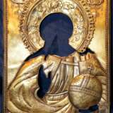 Старинная икона Спасителя в тяжелом кованом окладе из серебра 