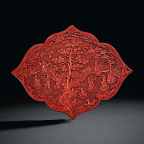 A CARVED RED LACQUER QUATREFOIL DISH - photo 1