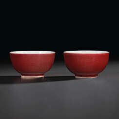 A PAIR OF COPPER-RED-GLAZED WINE CUPS
