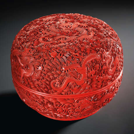 A CARVED RED LACQUER `NINE DRAGONS` BOX AND COVER - photo 1