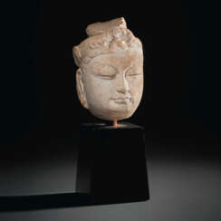 A SMALL MARBLE HEAD OF A BODHISATTVA
