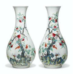 A PAIR OF FAMILLE ROSE &#39;PEACH&#39; VASES