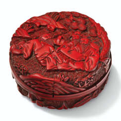 A SMALL CARVED RED LACQUER CIRCULAR BOX AND COVER