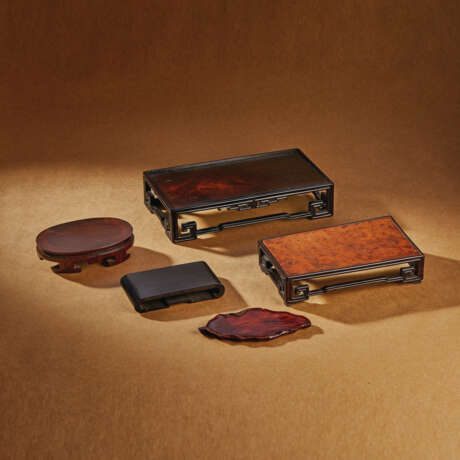 A GROUP OF FOUR HARDWOOD STANDS AND A LACQUERED WOOD TRAY - photo 1