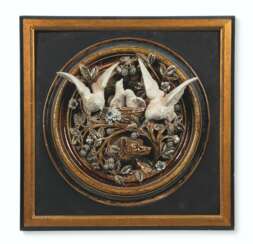 A DOULTON LAMBETH STONEWARE CIRCULAR HIGH-RELIEF WALL PLAQUE BY GEORGE TINWORTH