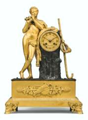 A LOUIS PHILIPPE ORMOLU-MOUNTED AND PATINATED BRONZE MANTEL CLOCK