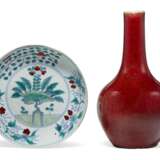 A DOUCAI DISH AND A RED-GLAZED BOTTLE VASE - photo 1