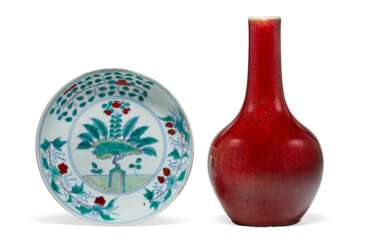 A DOUCAI DISH AND A RED-GLAZED BOTTLE VASE