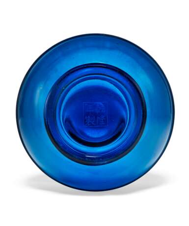 A BLUE GLASS BOTTLE VASE - photo 2