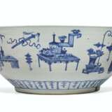 A LARGE BLUE AND WHITE 'ANTIQUES' BOWL - photo 1